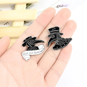 Plague doctor enamel brooch set with Wash Your Damn Hands ribbon in hand-held view