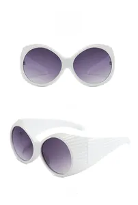 Detailed front and side views of white oversized sunglasses with gradient gray lenses