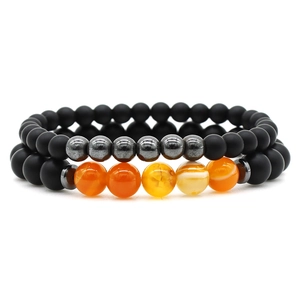 Matte onyx and volcano stone beaded bracelets set with gradient agate and hematite beads
