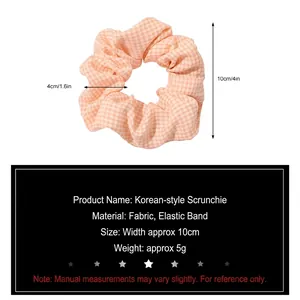 Pink plaid fabric scrunchie with 10cm outer diameter and soft elastic band for ponytails
