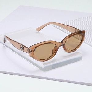 Retro cat-eye sunglasses with translucent brown frames and UV protection for women