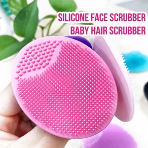 Pink silicone facial cleansing brush and baby hair massage brush with soft bristles