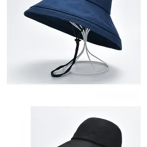 Detail of wide brim sun hat featuring durable fabric and adjustable windproof chin strap