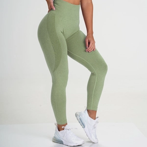 High-waist seamless green yoga pants with breathable mesh panels for fitness