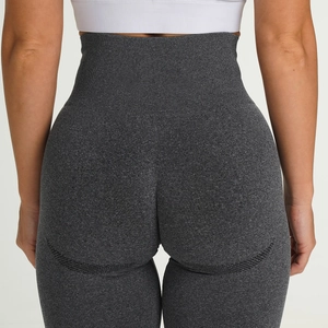 Detail of dark grey marl seamless leggings showing high waist ribbing and breathable mesh
