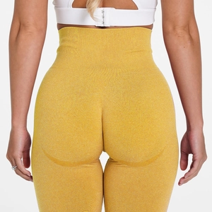 Macro detail of seamless ginger yoga leggings showing knit texture and booty lifting seam
