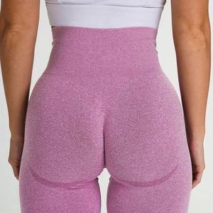 Detail of high waist seamless yoga pants with butt-lifting curved seams and purple texture