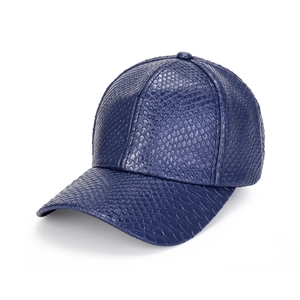 Navy blue faux leather baseball cap with crocodile skin texture and curved brim