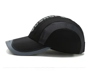 Detail view of breathable mesh panels and contrast grey edging on the black baseball cap