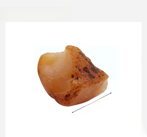 Macro detail of natural amber raw stone showing organic texture and 25-35mm size dimensions