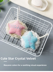 Close-up of pink star-shaped bath sponge in a storage basket with soft mesh detail
