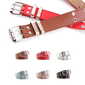 Grommet belt with double-prong buckle available in multiple colors for punk fashion styles