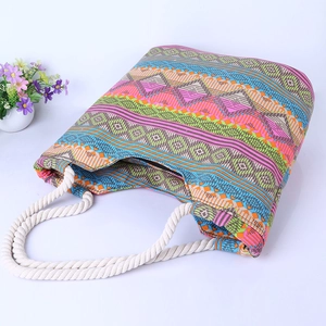 Ethnic geometric canvas tote bag with colorful diamond patterns and thick cotton rope handles