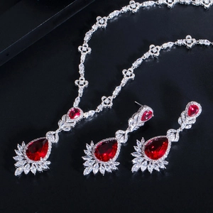 Exquisite bridal jewelry set with red teardrop gemstones and sparkling cubic zirconia