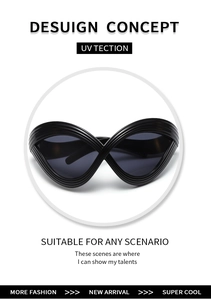 Detail of futuristic black infinity frame sunglasses with stylish wavy surface texture