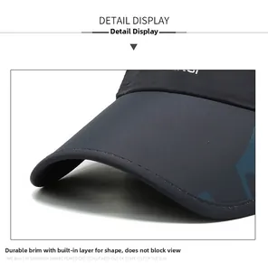 Detailed close-up of dark grey baseball cap brim with durable shaped inner layer