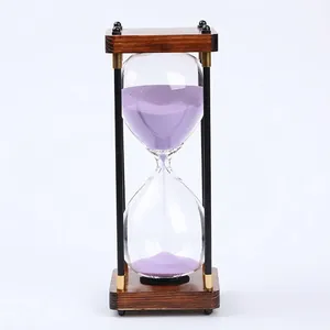 Vintage 30-minute hourglass timer with dark walnut wood base and purple sand detail