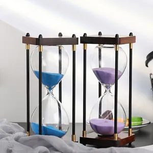 Vintage 30-minute hourglass timer with dark wood base and colorful sand for home decor