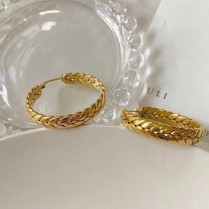 Elegantly woven 18K gold plated stainless steel hoop earrings in a wheat pattern