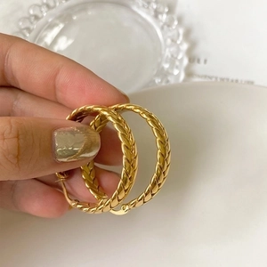 Chic 18K gold-plated braided hoop earrings for women in a twisted geometric style