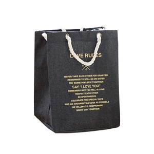Large dark grey cotton rope bag with Love Rules typography and durable woven texture