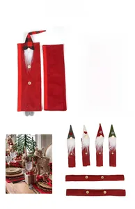 Close-up of festive gnome refrigerator handle covers with wooden buttons and plaid hats
