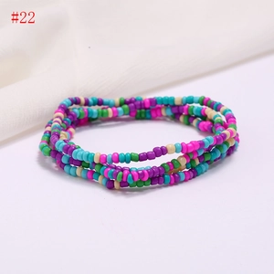 Close-up of colorful handmade multilayer bead chains featuring vibrant summer beach style