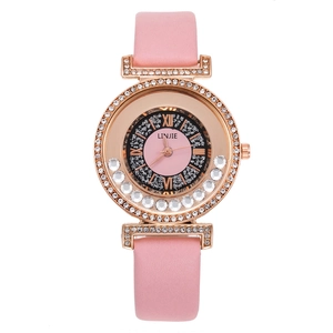 Montre quartz femme en or rose avec bracelet en cuir rose et lunette en strass