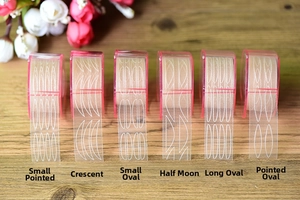 Detail showing six shapes of lace mesh eyelid tapes on rolls with pink cases