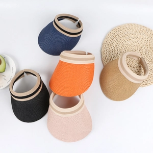 Kids summer straw sun visor hats in multiple colors with wide brims and ribbon detail