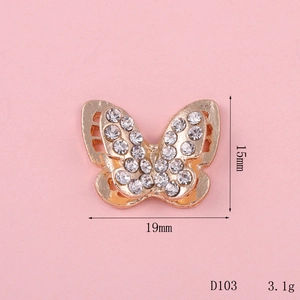 Detail of 19x15mm golden butterfly alloy accessory with white rhinestones and dimensions