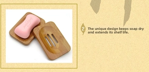 Detailed view of bamboo soap holder with drainage holes for keeping bar soap dry