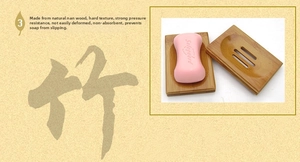 Detail of natural bamboo soap dish with drainage slots for mold resistance and durability