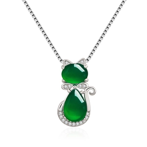 Silver cat necklace featuring green agate pendant on white background with reflection