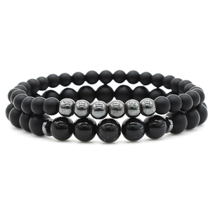 Detail shot of stacked black matte agate beads and metallic grey spacer beads