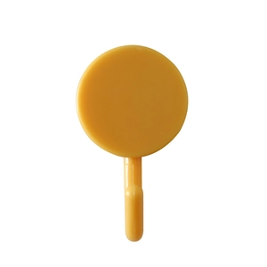 Self-adhesive 3-branch swivel hook in yellow plastic with a round base for bathroom tiles