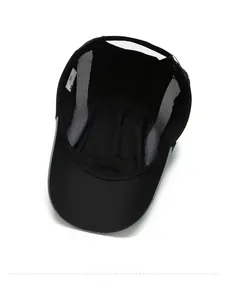 Detail view of the breathable mesh lining and reflective edge of the black baseball cap