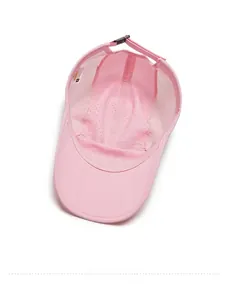 Detail view of pink kids sports cap interior featuring breathable mesh and adjustable strap
