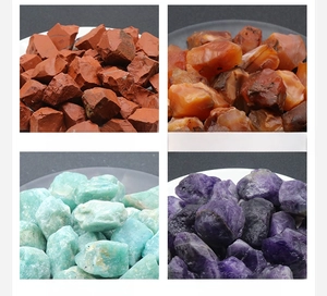Detailed view of raw red jasper, red agate, amazonite, and amethyst natural crystals