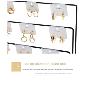 Detail of 0.4cm diameter metal bar on jewelry display stand for earring cards