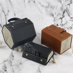Detail of folding hexagonal PU leather eyewear boxes with premium white stitching