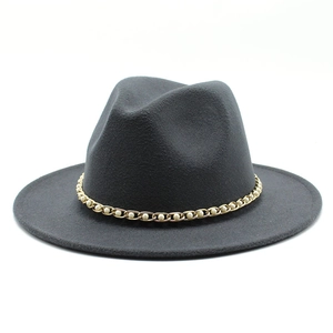 Detailed view of wide brim grey fedora with gold metal chain and white pearls accent