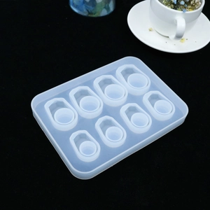Detail of 8-cavity translucent silicone mold for DIY resin bottle cap crafts