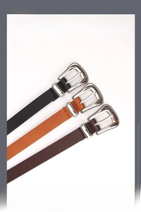 Detailed view of women's vintage faux leather belts with silver double pin buckles