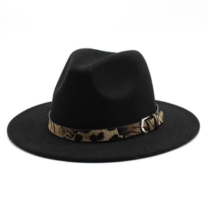 Detail of black wool fedora hat featuring a leopard print band and silver metal buckle