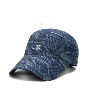 Detail of navy quick-dry sports cap showing gray geometric pattern and SDSRUI logo