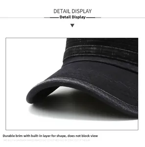 Close-up of a black military cap brim with durable stitching and cotton twill texture