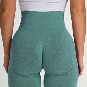 Close-up of seamless knit yoga pants with high waistband and push-up peach booty detail