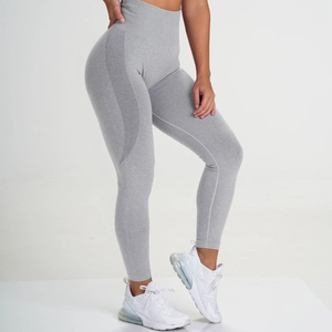 Close-up of seamless light grey high waist yoga leggings with dark grey side stripes