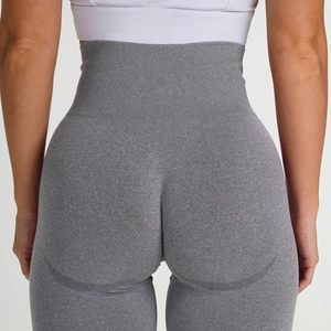 Close-up of high-waist seamless scrunch butt yoga pants in heathered gray fabric